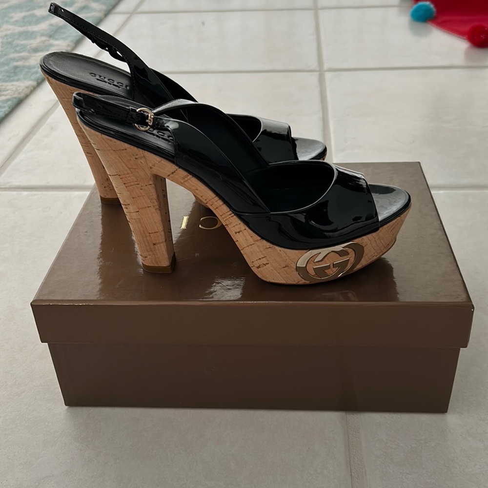 NIB Gucci shoes. Black with strap. 5 inch heel. Size 7 1/2. Amazing!